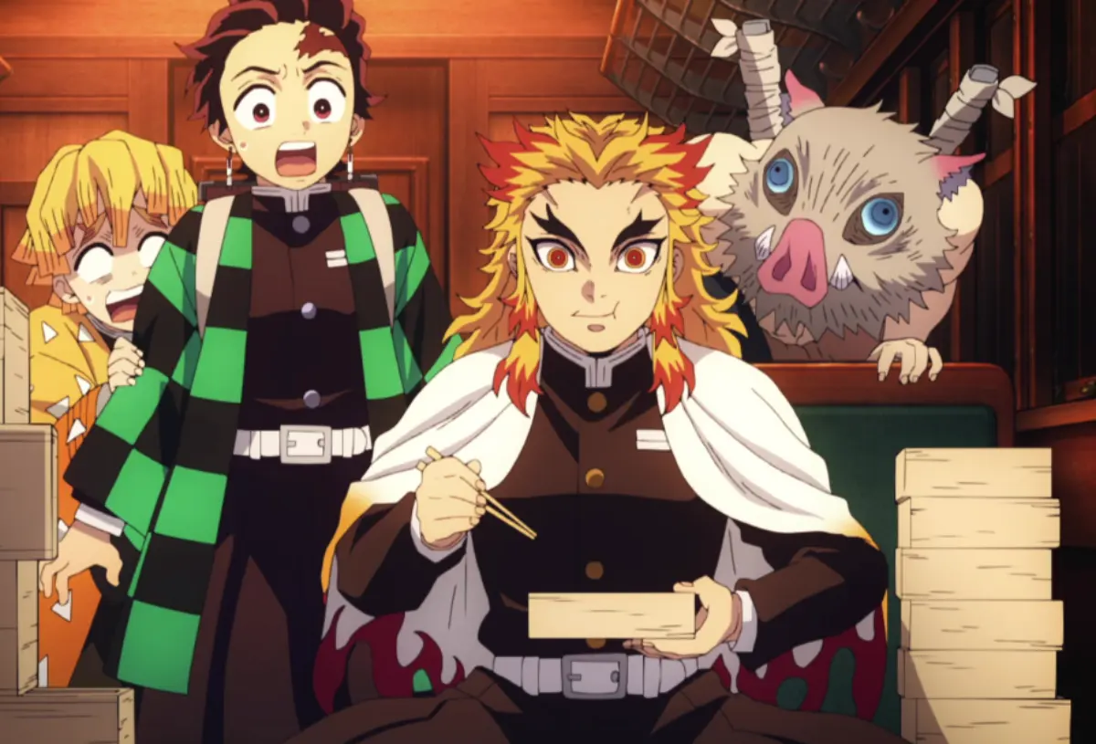 Rengoku with Tanjiro, Zenitsu and Inosuke sharing meal in Demon Slayer, showing his mentoring influence before sacrifice